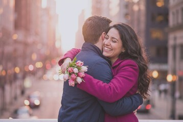 Couple enjoys a moment together in a city during sunset