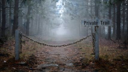 Private trail sign located in a wooded area, indicating restricted access within nature surroundings, guiding visitors and defining land use boundaries