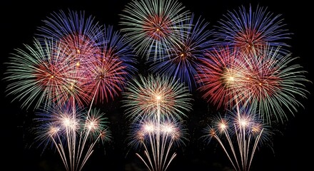 Stunning bursts of vibrant fireworks illuminating the dark night sky, creating a spectacular display of light and color for a festive celebration or special event