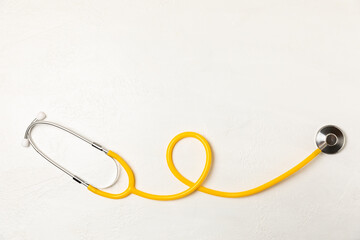 Stethoscope on the table. Medical instrument. Medical concept. Healthcare. Health Day.Doctor equipment. Cardiology. Heart disease.Lung diagnostics.Diagnosis of respiratory inflammation.Space for text