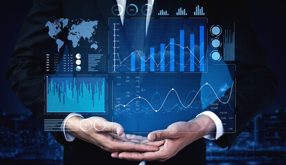 Business professional showcases futuristic data analytics and graphs with a high-tech interface, symbolizing performance improvement and strategic planning in a corporate environment. Scalp