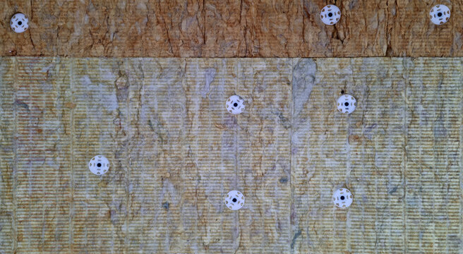 A detail of wall pressed thermal insulation materials,  and attached with dowels