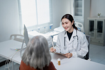 Doctor consulting patient discussing healthcare and senior care