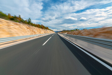 Driving a car at high speed on the open road