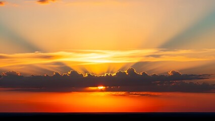 A serene sunrise over the ocean, with vibrant colors and majestic clouds