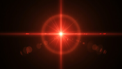 Bright red starburst lens flare light effect on dark background