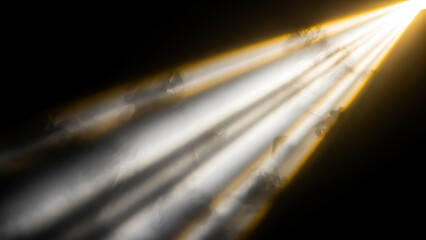 Golden volumetric light rays spotlight on black background with smoke