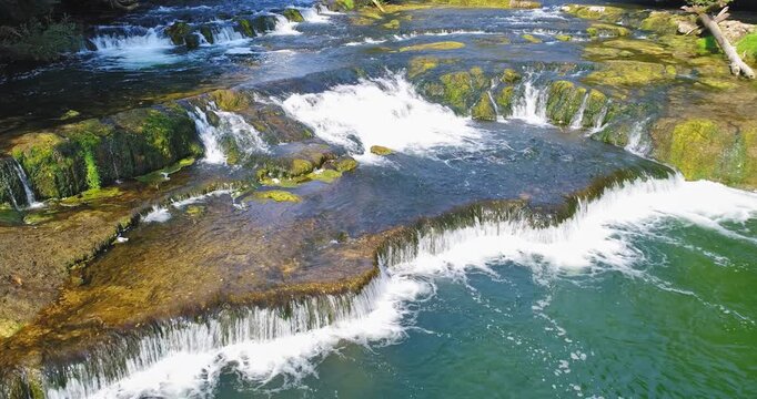 Waterfalls and river rapids on the Krka River near Žužemberk, Slovenia