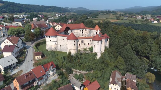 Aerial view of ZuZemberk castle above river