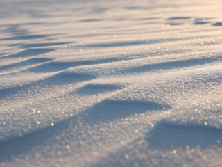 Rippled snow texture with sunlight sparkle