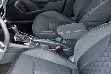 Armrest in the luxury passenger car, front seats