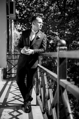 portrait of the groom of a man in the morning before the wedding