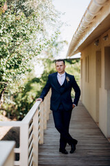 portrait of the groom of a man in the morning before the wedding