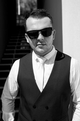 portrait of the groom of a man in the morning before the wedding