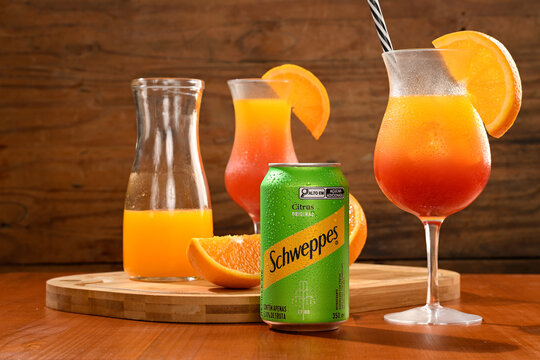 S&atilde;o Paulo, Brazil - December 19, 2025 - Vibrant citrus drinks and refreshing cocktails with Schweppes Citrus Original in a can.