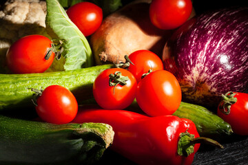 cherry tomato vegetable mix on black background