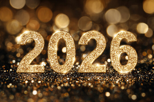 Festive gold glitter numbers 2026 sparkle on a dark bokeh background