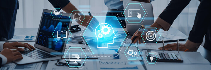 Dynamic team collaborating with advanced technology visuals, focusing on ideas, innovation, and business strategies in a modern workspace setting. Trope