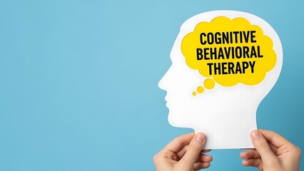 Cognitive behavioral therapy concept with paper cutout head
