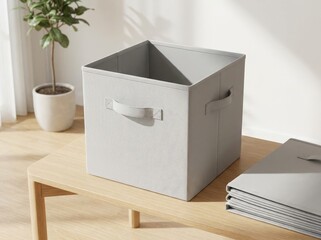 Gray fabric storage cube organizer with handles on table