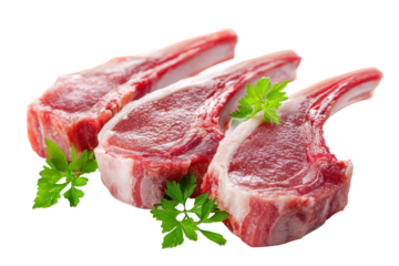 Raw lamb chops with parsley isolated on transparent background. Raw lamb chops with fresh parsley garnishes isolated on white background.