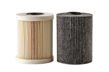 Cylindrical fuel filters one clean and one dirty isolated on transparent background. Two cylindrical filters showing clean and dirty conditions isolated on white background.