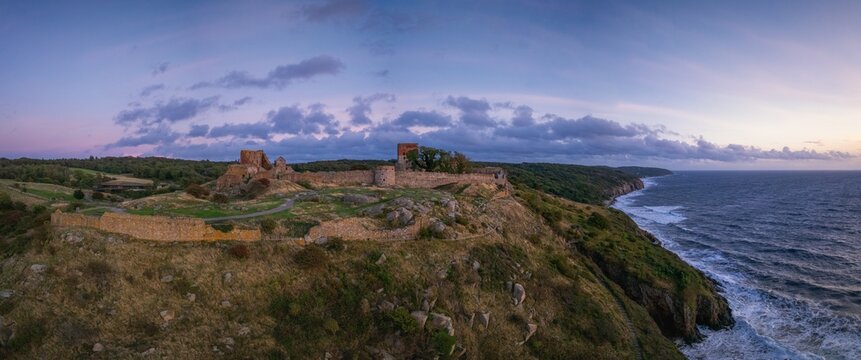 drone panorama landscape of Hammershus fortress and the rugged shoreline of the north coast of Bornholm Island
