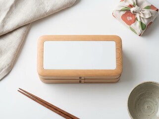 Wooden bento box with white lid and chopsticks for meal