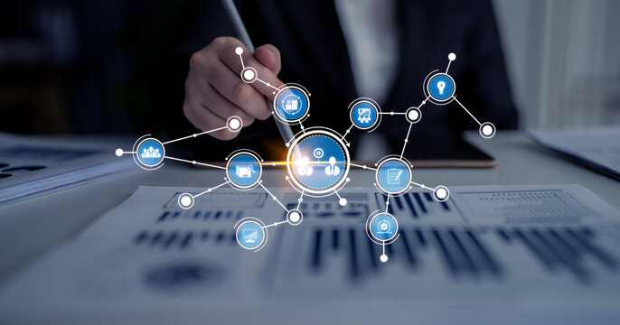 A modern workspace showcasing business analytics through data visualization and network connection, highlighting the importance of strategy and insights in decision-making. Tessel - Powered by Adobe