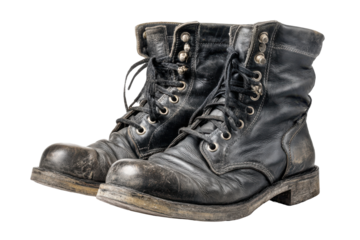 Pair of worn black leather combat boots isolated on transparent background. Pair of worn leather combat boots isolated on white background.