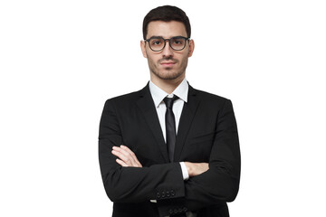 Young businessman in a black suit and glasses standing with crossed arms