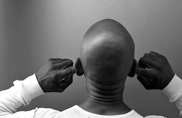 deafness suffering from deafness and hearing loss Senior man cupping his ear having difficulty hearing on gray background with people stock photo stock image