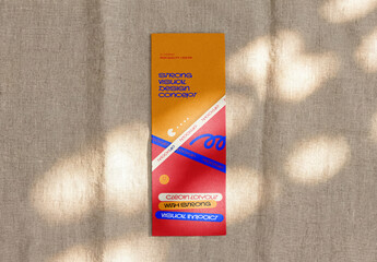 Template Mockup Vertical Flyer Branding and Identity Design on Fabric Background with Soft Natural Light