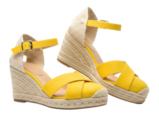 A pair of bright yellow wedge sandals with thick woven jute heel and sole isolated on transparent background