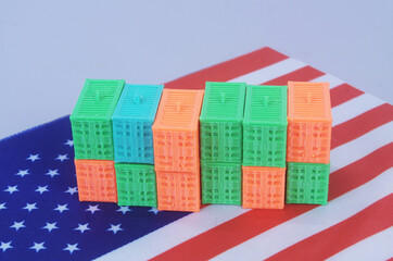 Obraz premium Many cargo containers on USA flag. American import and export concept.