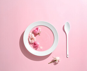 plate with cutlery and flowers