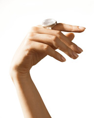 Elegant Female Hand with Nude Manicure and Rings on White Background