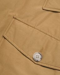 Mustard Parka Pocket Flap with Button Close-Up © Anastasiia