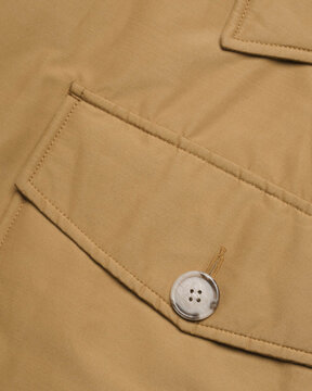 Mustard Parka Pocket Flap with Button Close-Up