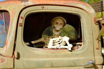 skeleton decoration in the old truck