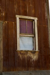 old wooden window on a rustic building