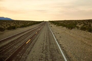 empty desert road to nowhere