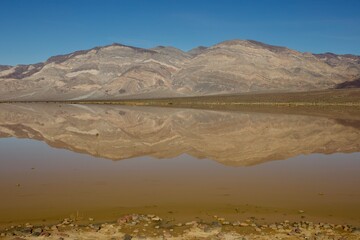 lake and mountains in the desert