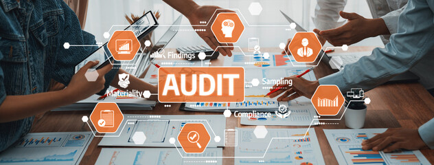 Professionals collaborate on an audit process in a modern office, utilizing data visualizations to enhance discussion and improve decision-making strategies for business growth. Amity