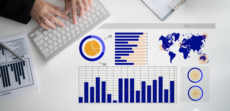 A business professional utilizes a keyboard while analyzing data displayed on charts and graphs. The workspace showcases various statistical insights for informed decision-making. Impute - Powered by Adobe