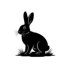 Obraz premium A striking black silhouette of a rabbit sitting amongst blades of grass