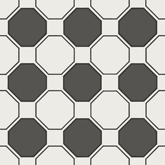Obraz premium Repeating geometric pattern of dark and light gray octagonal tiles