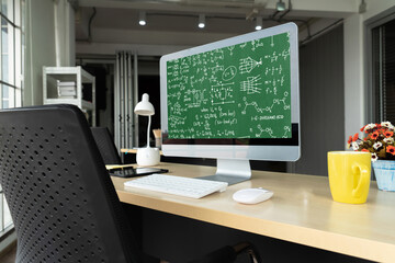 Mathematic equations and modish formula on computer screen showing concept of science and education