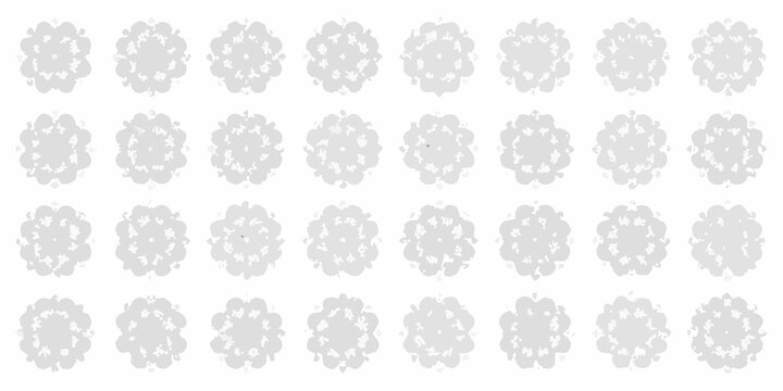 A repeating pattern of delicate gray floral or rosette shapes on white