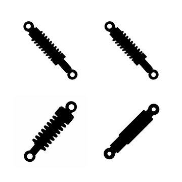 Four black silhouette icons illustrating various automotive shock absorbers and suspension components